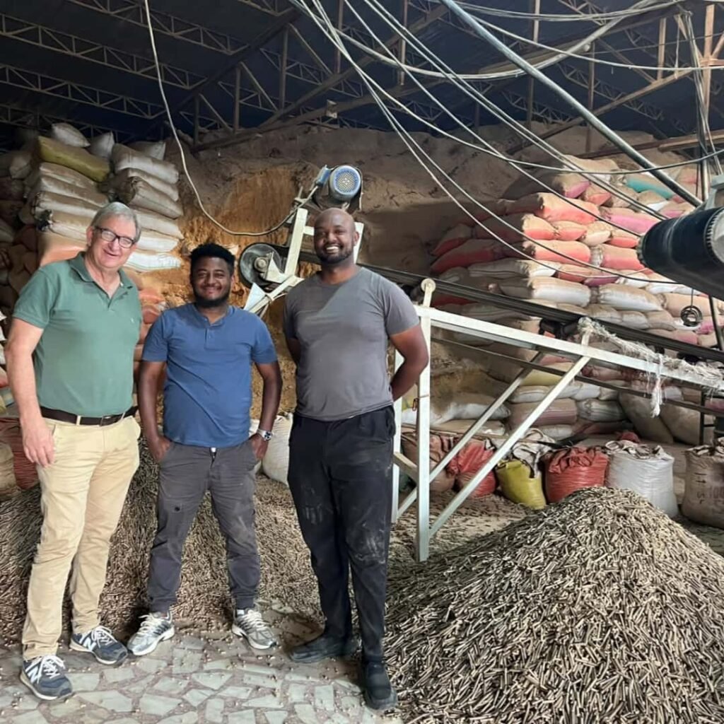 Clients visit finished biomass wood pellet production site in Ethiopia, finished wood pellets on‑site
