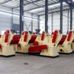 Batch wood crusher machines displayed inside manufacturing workshop