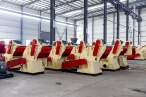 Batch wood crusher machines displayed inside manufacturing workshop